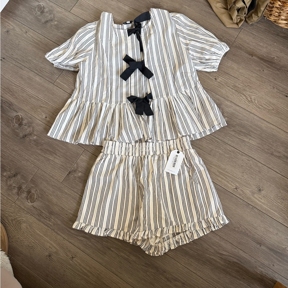 Striped Peplum Top with Bow Detail - Black/White